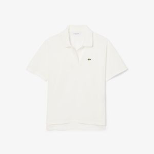 Polo fluida relaxed fit in piqué Bianco